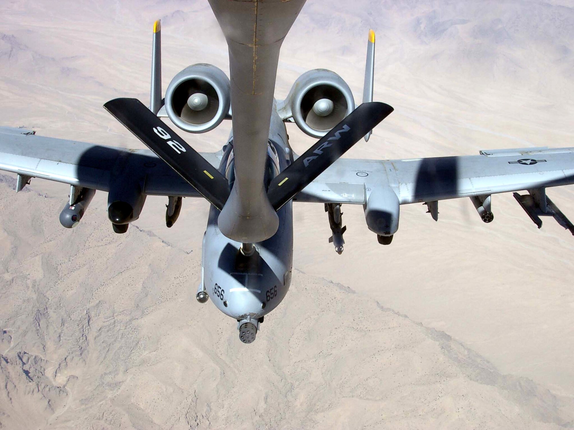 A KC-135 Stratotanker from the 22nd Expeditionary Air Refueling Squadron refuels an A-10 Thunderbolt II over Afghanistan. The 22nd EARS is part of the 376th Air Expeditionary Wing at Manas Air Base, Kyrgyzstan. (U.S. Air Force photo/Airman 1st Class Lonnie Mast)
