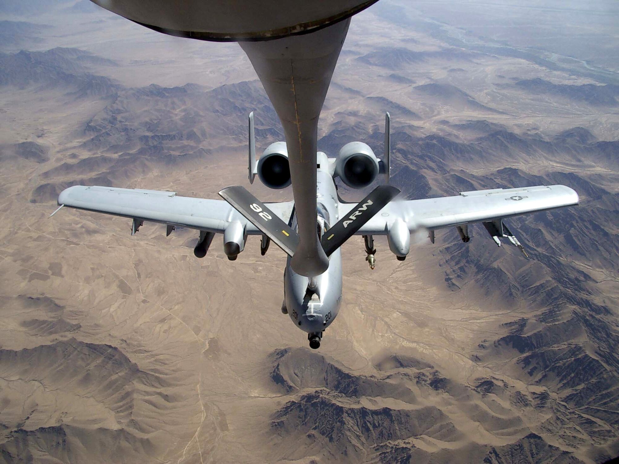 A KC-135 Stratotanker from the 22nd Expeditionary Air Refueling Squadron prepares to refuel an A-10 Thunderbolt II over Afghanistan. The 22nd EARS is part of the 376th Air Expeditionary Wing at Manas Air Base, Kyrgyzstan. (U.S. Air Force photo/Airman 1st Class Lonnie Mast)
