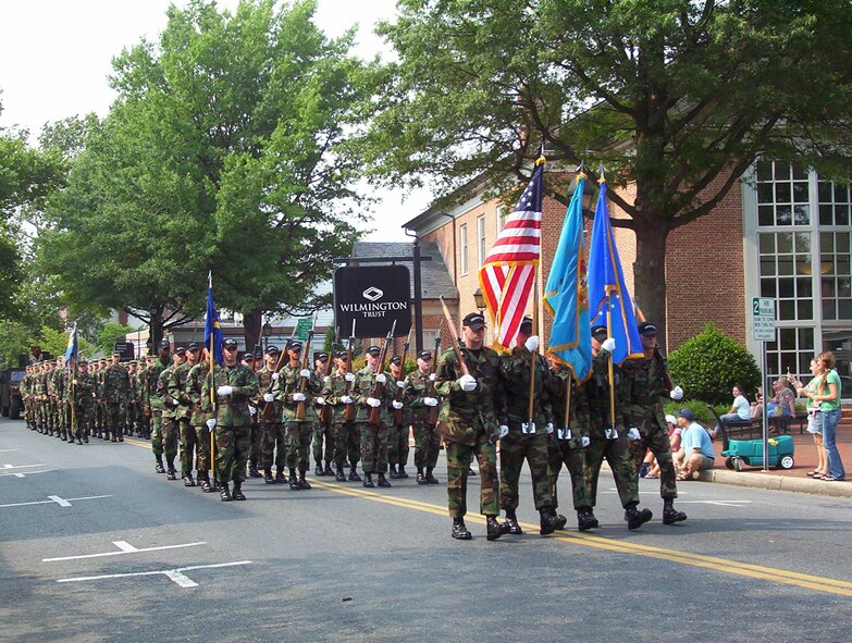 More than 60 members of the Dover Team march in Tuesday's Independence Day Parade in the city of Dover. 
