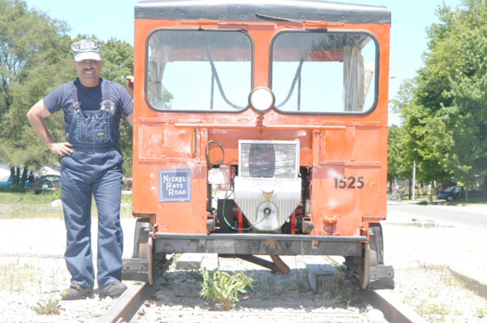 GRISSOM AIR RESERVE BASE, Ind --- Master Sgt. Les McConnell, 434th Air Refueling Wing historian, stands next to his 1953 Fairmont S-2 Series Track Car -- also known as a speeder car.  (U.S. Air Force photo/Senior Airman Christopher Bolen)