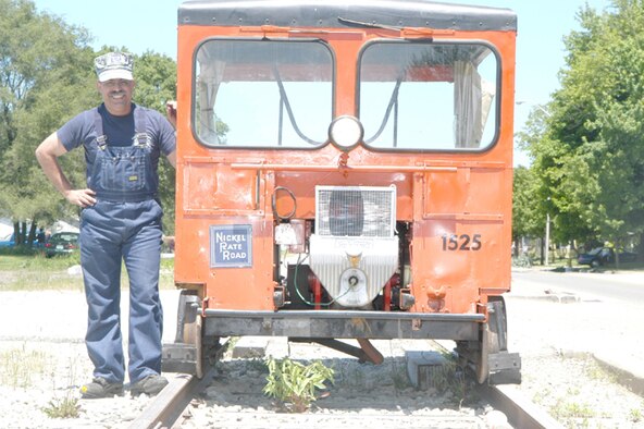 GRISSOM AIR RESERVE BASE, Ind --- Master Sgt. Les McConnell, 434th Air Refueling Wing historian, stands next to his 1953 Fairmont S-2 Series Track Car -- also known as a speeder car.  (U.S. Air Force photo/Senior Airman Christopher Bolen)