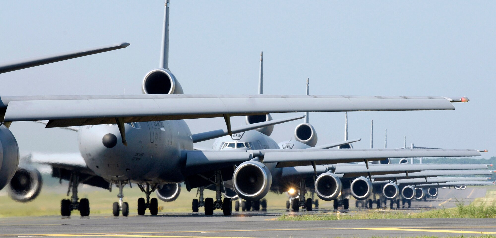 KC-10 Extenders and C-17 Globemaster IIIs from McGuire Air Force Base, N.J., taxi down the flightline during the emergency response exercise Elephant Walk. This is the first time C-17s and KC-10s have been paired in an exercise. Sixteen aircraft launched from McGuire on Friday, June 30, as part of the exercise. (U.S. Air Force photo/Brian Dyjak)

