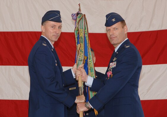 Col. Lee DeRemer (right) relinquished command of the 319th Operations Group June 29 in an ceremony presided over by Col. Bill Bender, 319th Air Refueling Wing commander.  Col. DeRemer thanked the group for their hard work and sacrifice. (Photo by Airman First Class Chad Kellum)
