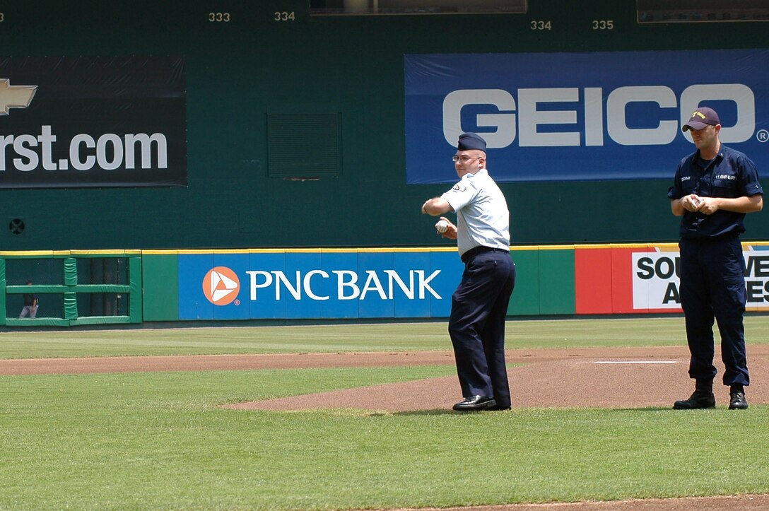 Senior Airman Joseph Buzanowski was one of five servicemembers given the opportunity to throw out a ceremonial "first pitch" before the Washington Nationals game against the Tampa Bay Devil Rays on Sunday, July 2. The event was part of the July Fourth weekend's "Military Appreciation Day" activities at Robert F. Kennedy Memorial Stadium. Airman Buzanowski is assigned to Detachment 16, Air Force News Agency, in Washington, D.C. (U.S. Air Force photo/Staff Sgt. C. Todd Lopez)