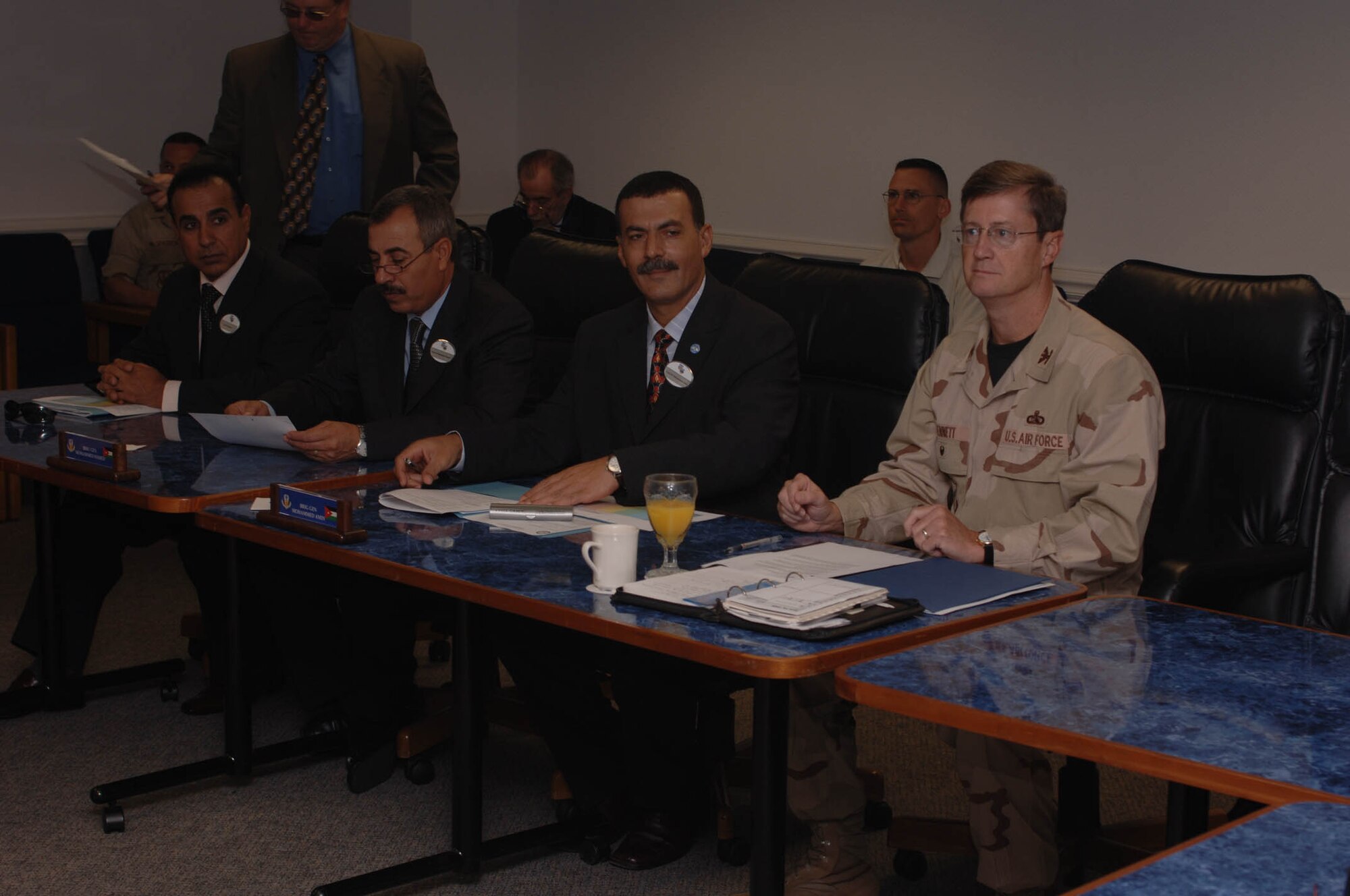 From right to left, Col. Robert Bennett, head of U.S. Delegation from U.S. Central Command, discusses command and control interoperability with Brig. Gen. Mohammed Amin, Royal Jordanian Air Force director of air operations, Brig. Gen. Mohammed Hamed, Jordan Armed Forces General Headquarters acting director of planning and organization, and Brig. Gen. Khaled Mahmoud, Jordan Armed Forces brigade commander for special operations command, June 21 at Shaw. Eight senior ranking members from the Jordan Armed Forces were here from June 19 - 28 for the Command and Control Interoperability Board Meeting, a CENTCOM-sponsored event. CENTCOM co-chairs the board with the Jordan Armed Forces. The purpose of the board is to foster command, control and communications interoperability between the United States' and Jordan's armed forces. Although this is a CENTCOM-sponsored event, it is the first time a service component, USCENTAF, has been the host. Representatives from CENTCOM, CENTAF, Navy Central Command, Army Central Command, Special Operations Central Command and other U.S. Government agencies were in attendance. (U.S. Air Force photo/Airman Matthew Davis)

