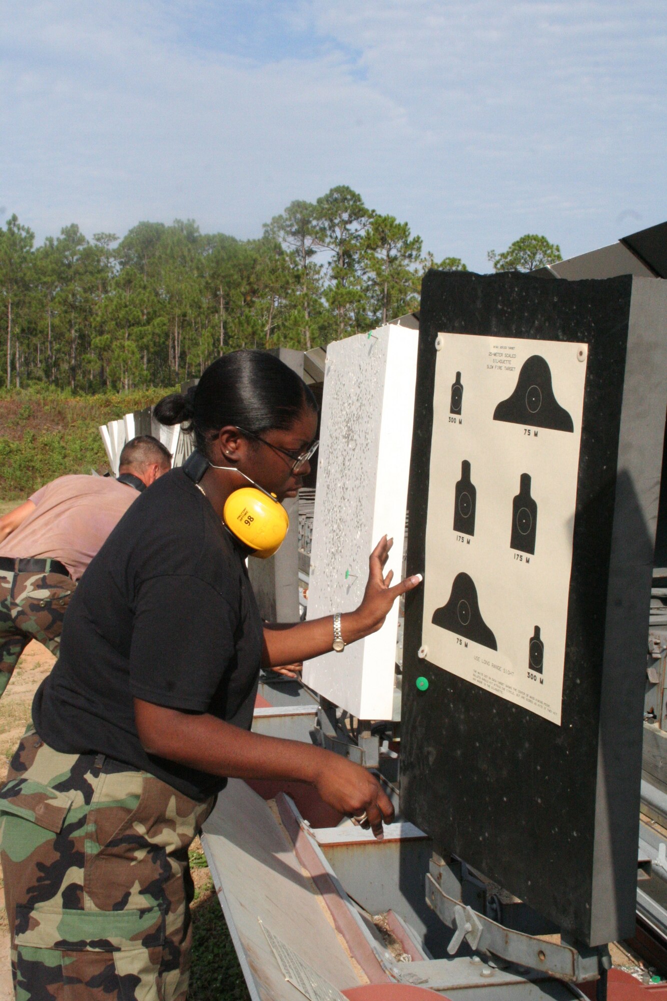 Staff Sgt. Summer Kelly. AFSOF, replaces her shooting diagram.