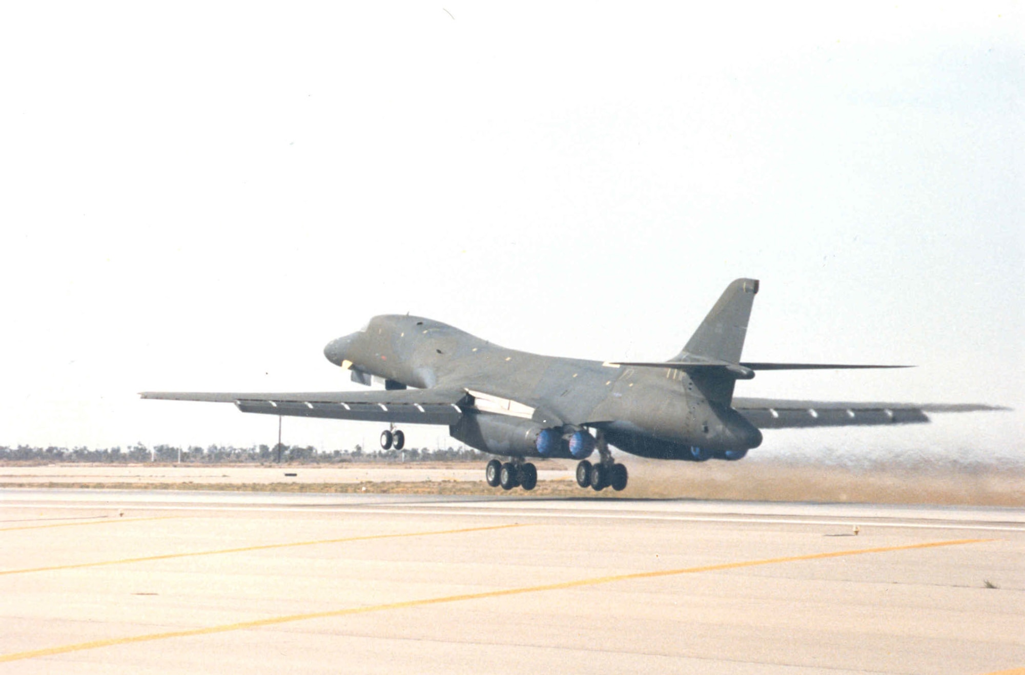 Rockwell International B-1B takeoff on Oct. 25, 1986. Note the lit afterburners. (U.S. Air Force photo)