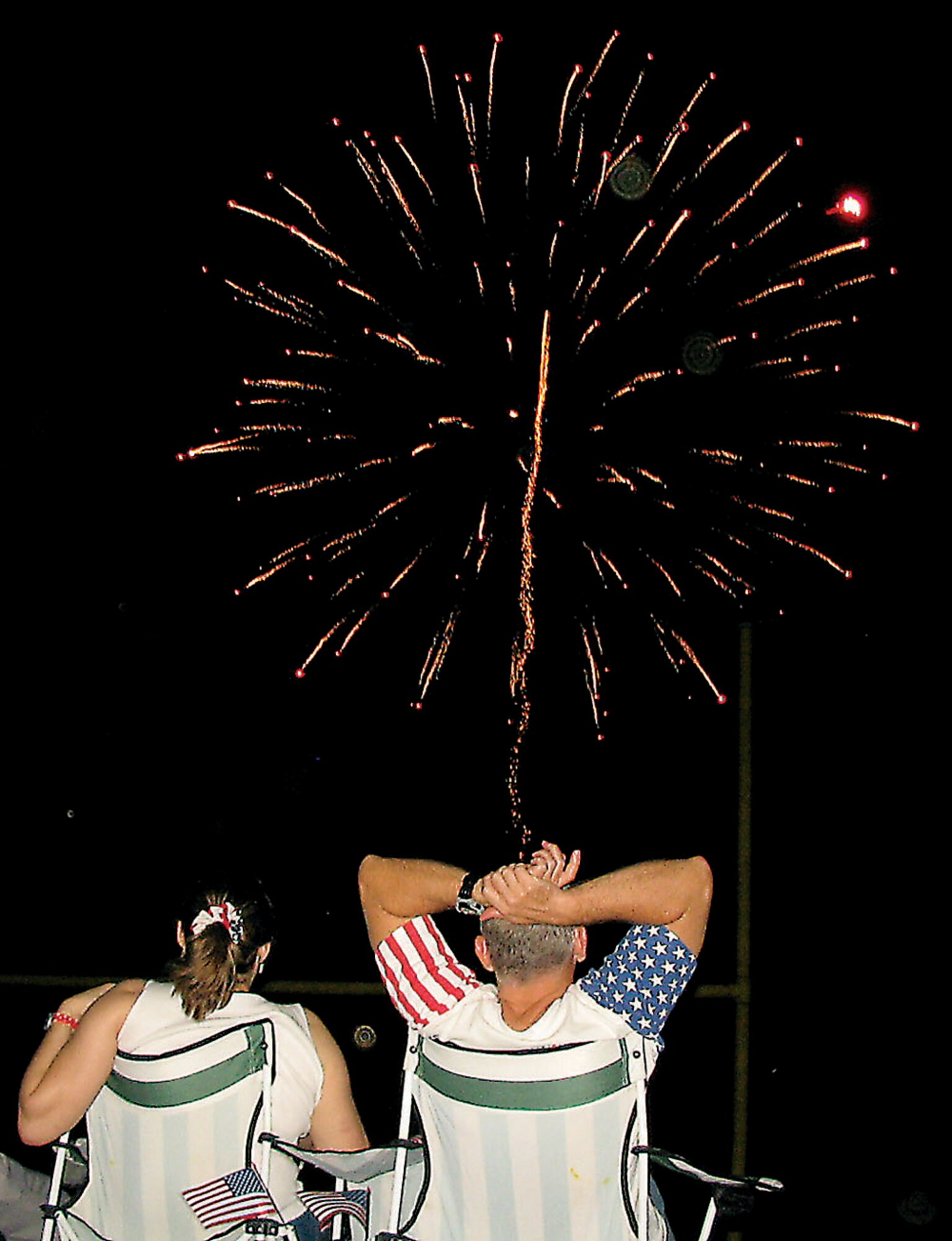 Spectators enjoy the 30-minute fireworks show.  (U.S. Air Force photo/Tech. Sgt. Kevin Williams)