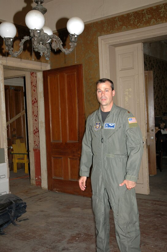 Maj. Craig Drescher shows off an interior room of his recently acquired historic home.  (U.S. Air Force Photo by Mr. Jeff Melvin)