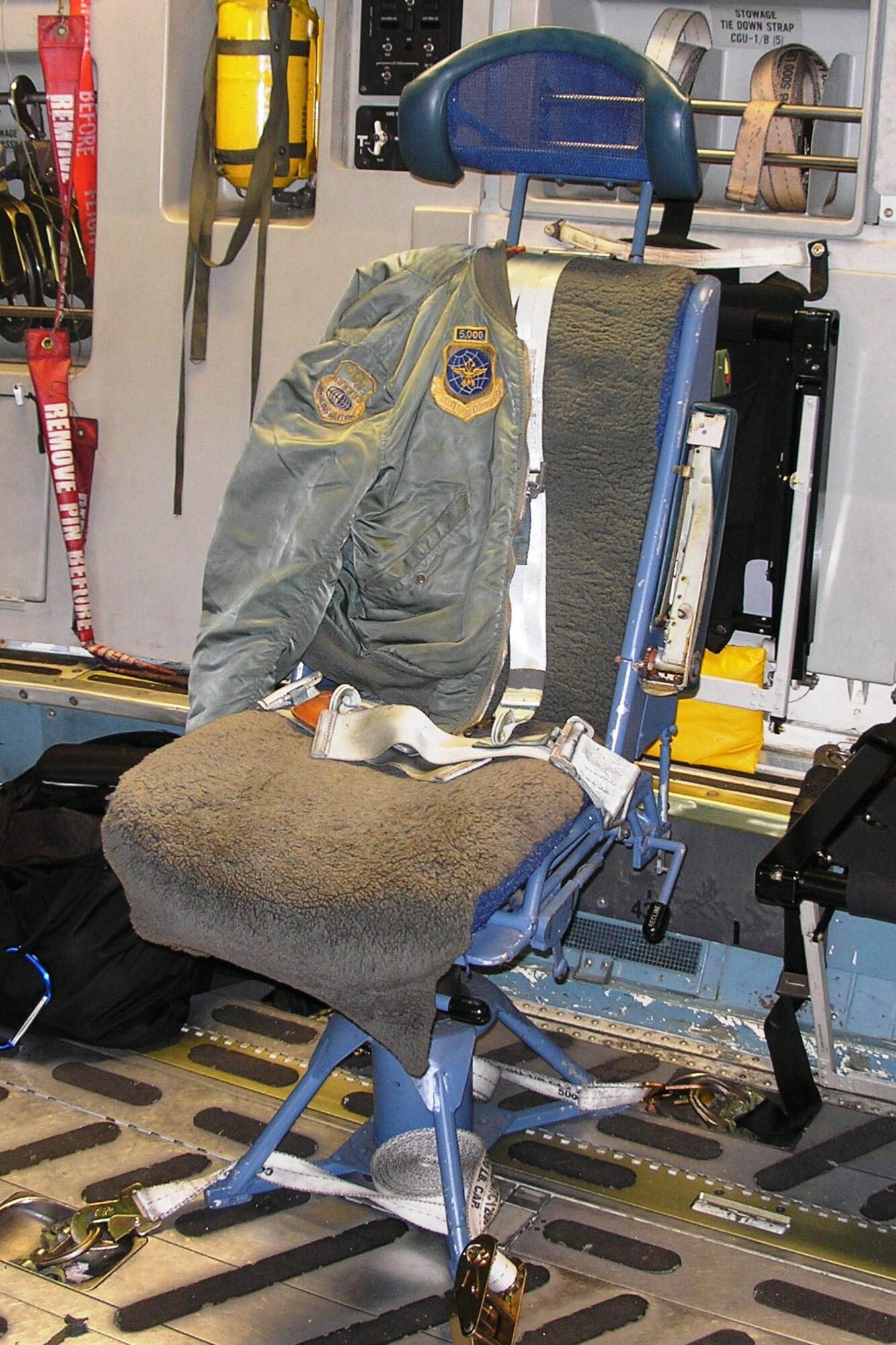 Switching over: This old C-141 Starlifter flight engineer chair has logged 3.5 flying hours onboard a C-17 after it made the trip to Wright-Patterson Air Force Base, Ohio, for the retirement ceremony for the C-141. (Photo by Chief Master Sgt. Charlie Hall, USAFR)