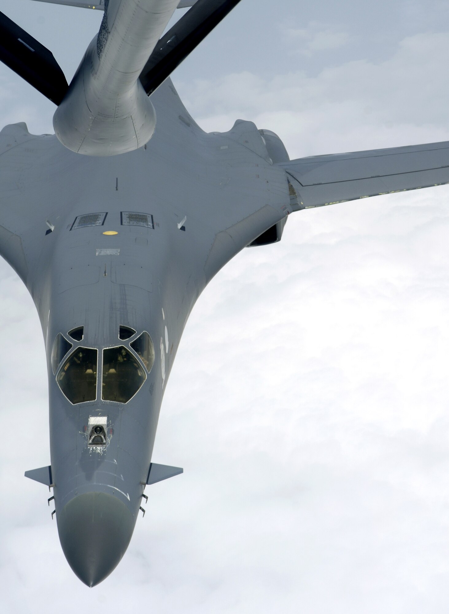 A B-1B Lancer prepares to connect with a KC-135 Stratotanker refueling boom over the Indian Ocean on Friday, July 7. The B-1 was flying a close-air support mission in support of Operation Enduring Freedom. The B-1 and the KC-135 are stationed at a forward operating base in Southwest Asia. (U.S. Air Force photo/Senior Airman Brian Ferguson)