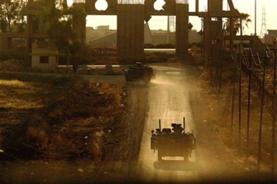 U.S. Army soldiers leave Forward Operating Base Marez in Mosul, Iraq, in a Stryker combat vehicle to conduct a cordon and knock patrol, July 1, 2006. The soldiers are from 1st Battalion, 17th Infantry Regiment, 172nd Stryker Brigade Combat Team based out of Fort Wainwright, Alaska. 
