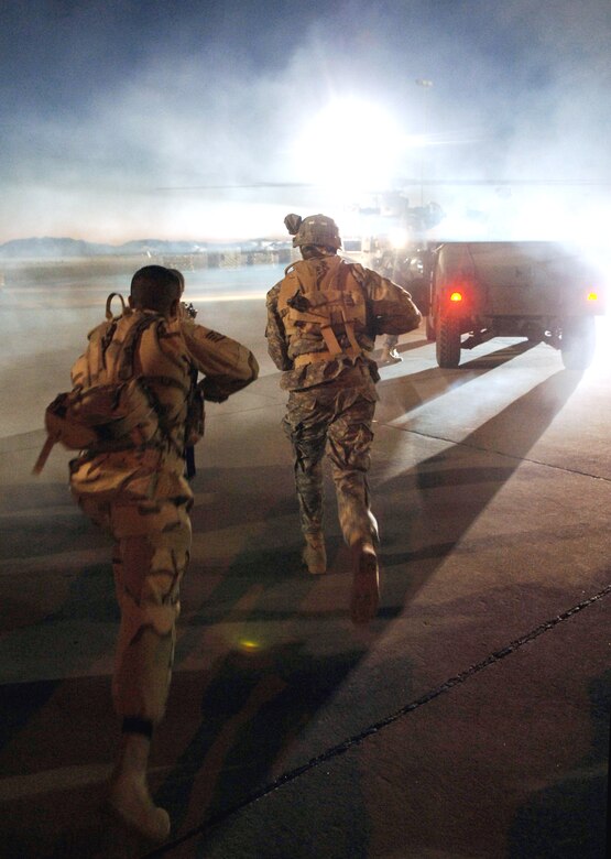 Airmen fill the roles of extras on the set of the movie "Transformers" during filming at Holloman Air Force Base, N.M., on May 30. The movie is scheduled for release in July 2007. (U.S. Air Force photo/Tech. Sgt. Larry A. Simmons)
