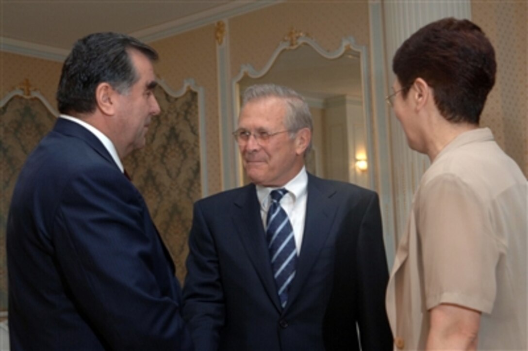 The president of Tajikistan, Emomali Rahmonov, welcomes U.S. Defense Secretary Donald H. Rumsfeld to Dushanbe prior to their meeting to discuss defense issues of mutual interest, July 10, 2006.