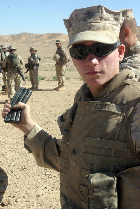 Corporal (Cpl) Eric Eckel with the 24th Marine Expeditionary Unit's (MEU) Command Element (CE) participates in a Battlefield Zero (BZO) exercise to sight in his weapon. Performing this exercise ensures that Marines weapons are properly sighted in for any altercation that might happen. (US Marine Corps photo by Lance Corporal Andrew Carlson)