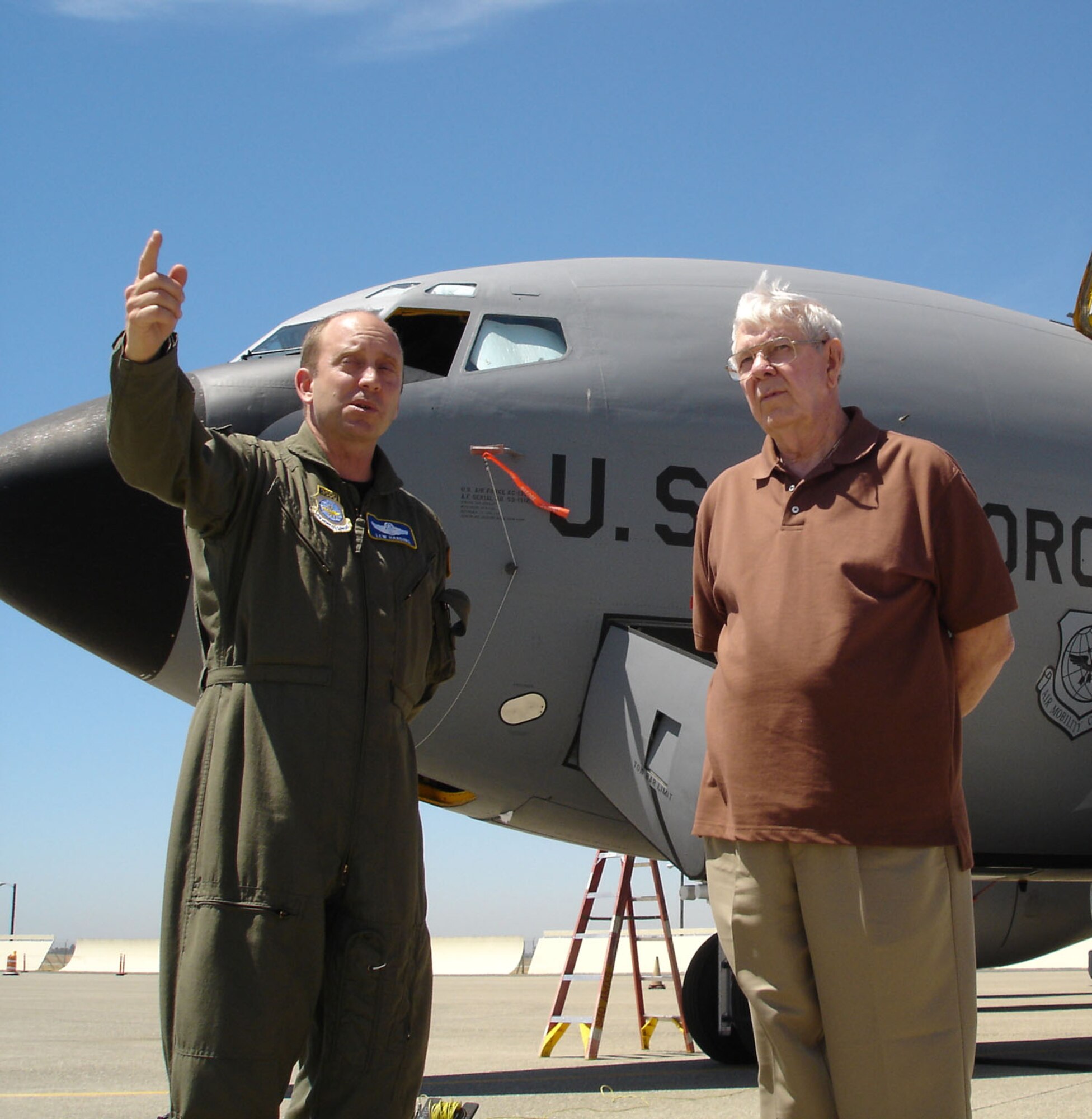 Air Force Reservist Lt. Col. Lew Harding, 314th Air Refueling Squadron, director of operations, gives a KC-135 tour to Maj. (Retired) Vernon Byrd, the author of "Passing Gas: The History of Inflight Refueling" at Beale Air Force Base, Calif., June 10, 2006.  Major Byrd's visit was in conjuction with a video interview to be used during festivities for the 50th Anniversary of the KC-135.  (U.S. Air Force photo/Stacey Knott)
