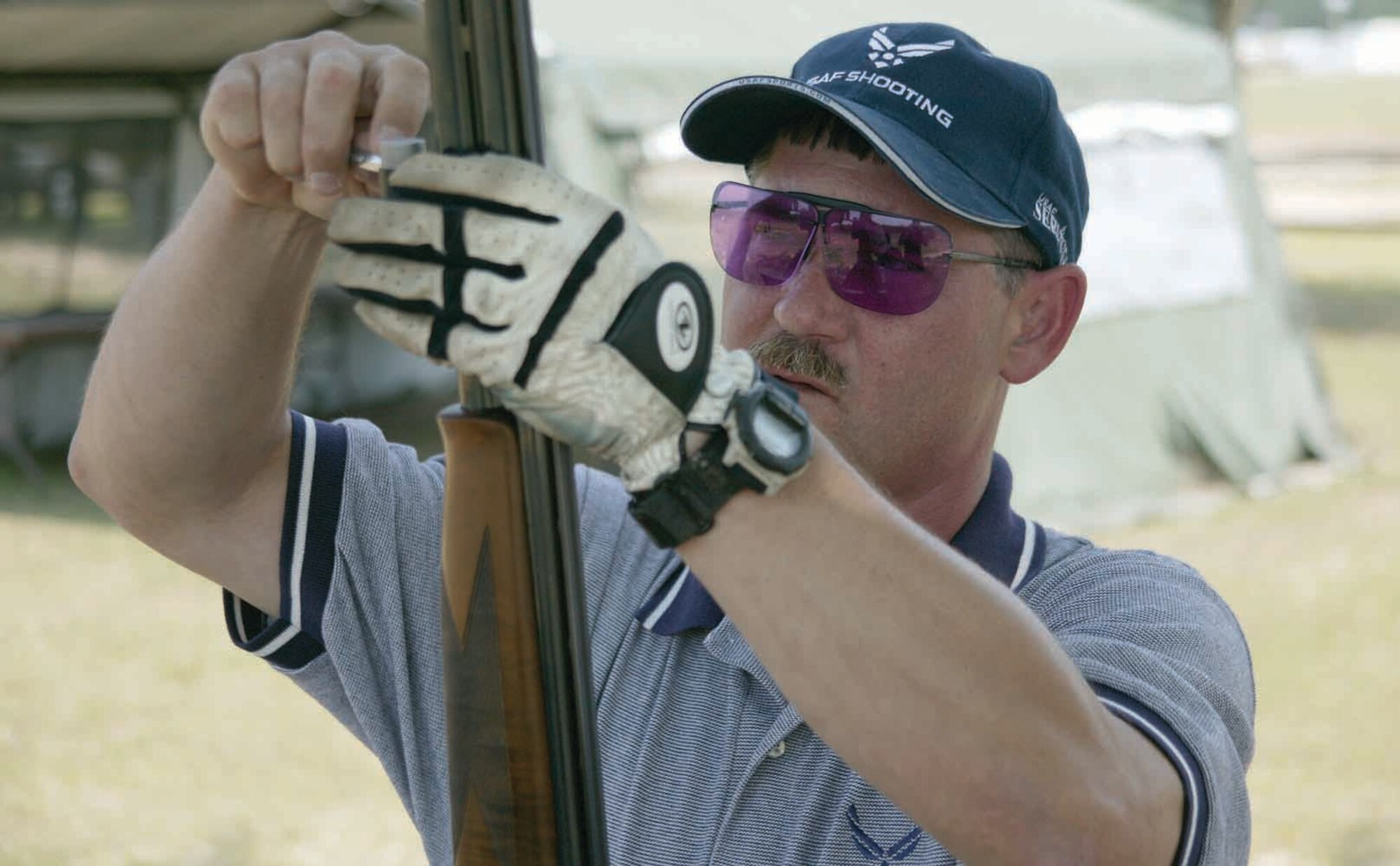 Sgt. Yanick assembles his weapon prior to practice.  (U.S. Air Force photo/Senior Airman John Gordinier)