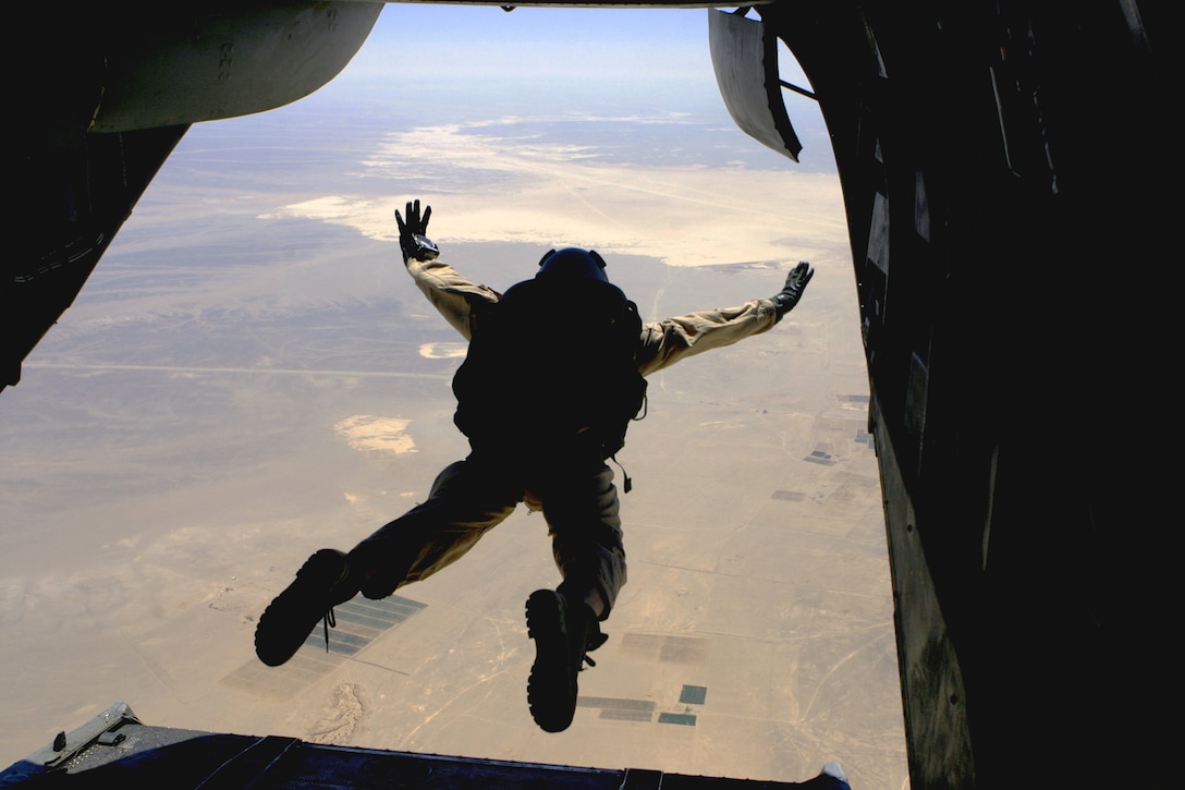 Gunnery Sgt. Edward McDermott, the platoon sergeant for the 24th Marine Expeditionary Unit?s Maritime Special Purpose Force, free falls from the back gate of a CH-46E Sea Knight during jump training July 14.  McDermott, a native of Richmond, Mich., and the Marines of MSPF conducted the training while on deployment to the Central Command theater of operation.