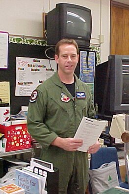 Maj. Chris Anderson, 93rd Bomb Squadron B-52 instructor navigator, speaks with students at Harding Middle School, Cedar Rapids, Iowa. (U.S. Air Force courtesy photo)