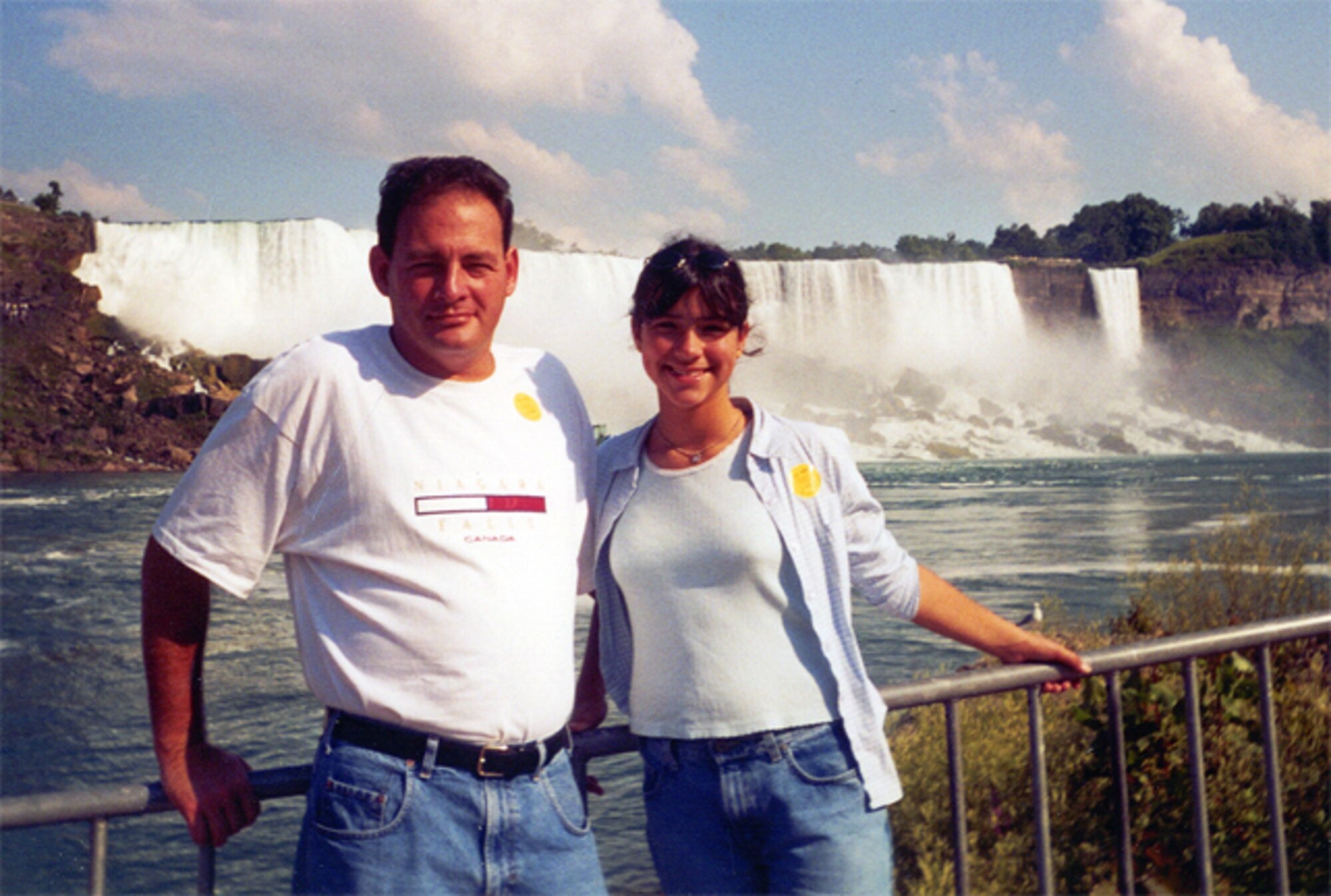 Keeping the memory alive: Tech. Sgt. Derrol Turner, a reservist with the 315th Maintenance Squadron, Charleston AFB, S.C., and his daughter, Lea, pose during a trip to Niagara Falls, N.Y.  Following the death of his daughter in 2004, Sergeant Turner created a scholarship in her name.