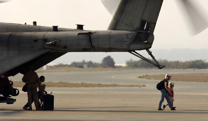 Cyprus ? U.S. citizens exit a CH-53 Super Stallion helicopter July 17 in Cyprus following their flight from the U.S. Embassy in Beirut, Lebanon. At the request of the U.S. Ambassador to Lebanon and at the direction of the Secretary of Defense, the United States Central Command and 24th Marine Expeditionary Unit are assisting with the departure of U.S. citizens from Lebanon. The helicopters are attached to Marine Medium Helicopter Squadron 365.