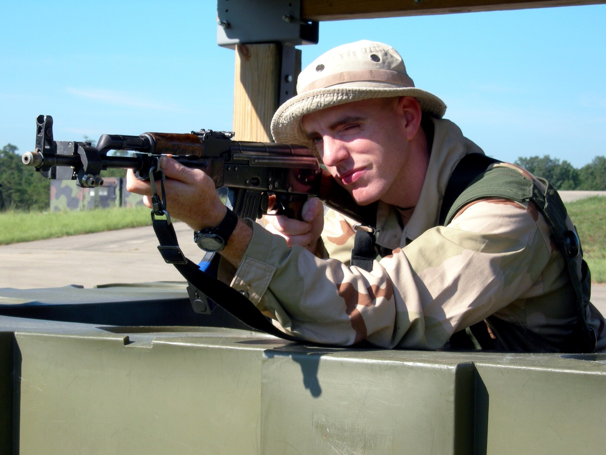 Senior Airman David Branch portrays a private in a foreign national army during an Exercise Eagle Flag 06-3 scenario at Naval Air Engineering Station Lakehurst, N.J., on July 14. The exercise tests Airmen from various career fields on their expeditionary combat support skills. Airman Branch is assigned to the 52nd Combat Communications Squadron at Robins Air Force Base, Ga. (U.S. Air Force photo/Tom Fuller)