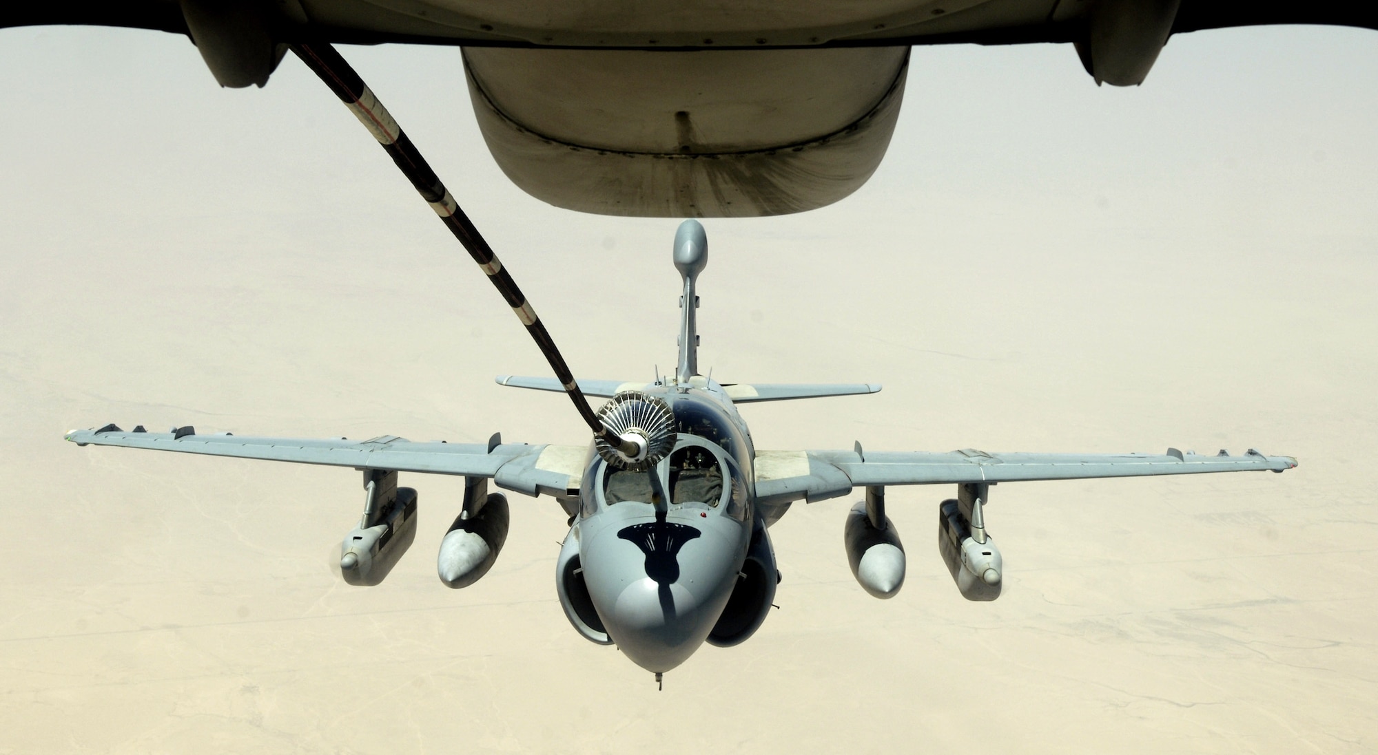 An EA-6 Prowler refuels from the drogue of a KC-10 Extender on July 18. The KC-10 is with the 908th Expeditionary Air Refueling Squadron in Southwest Asia. (U.S. Air Force photo/Senior Airman Brian Ferguson)

