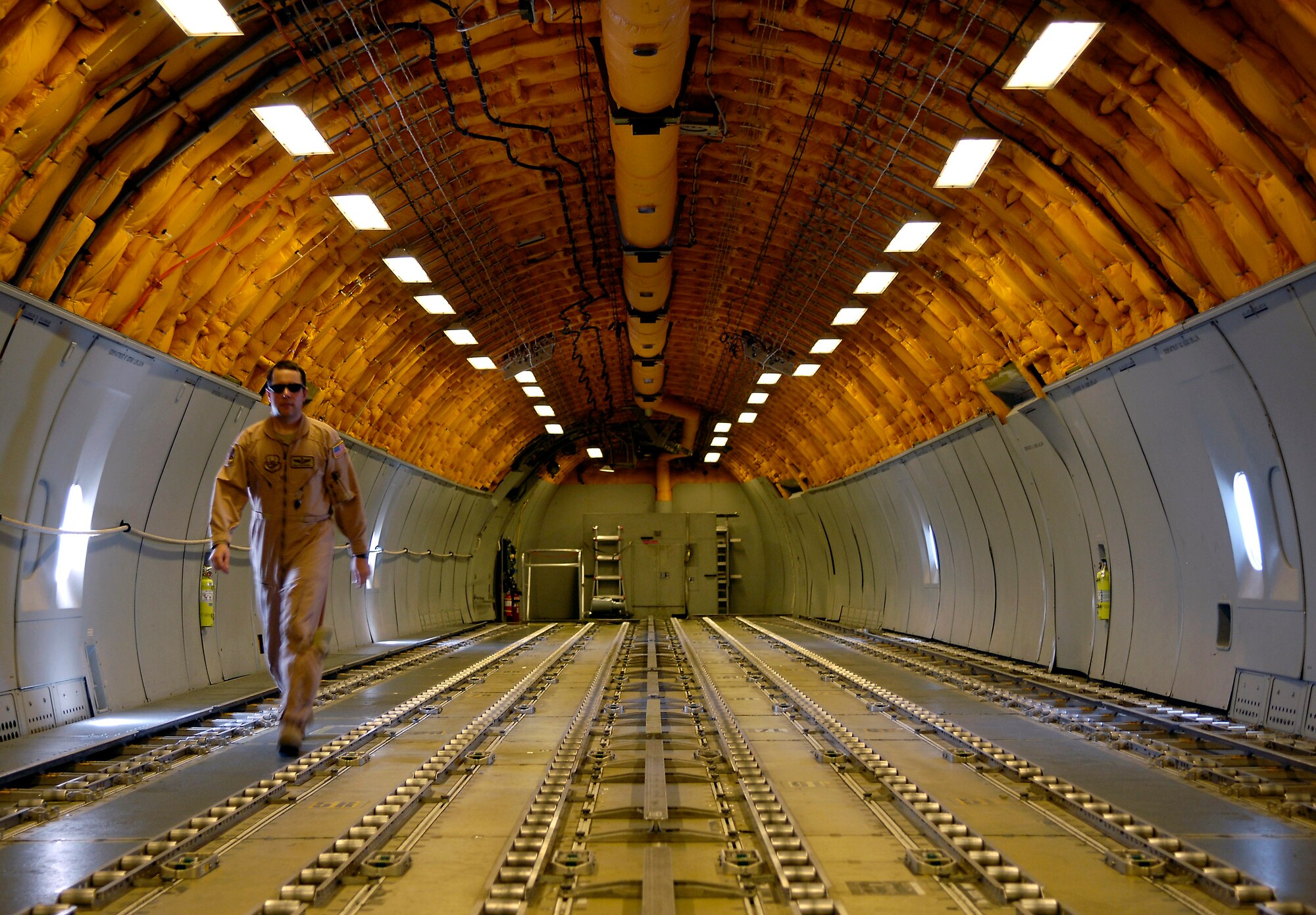Master Sgt. Todd McPeak walks back from the refueling pod of a KC-10 Extender during an Operation Iraqi Freedom mission on July 18. Sergeant McPeak is a boom operator for the 908th Expeditionary Air Refueling Squadron in Southwest Asia. (U.S. Air Force photo/Senior Airman Brian Ferguson)
