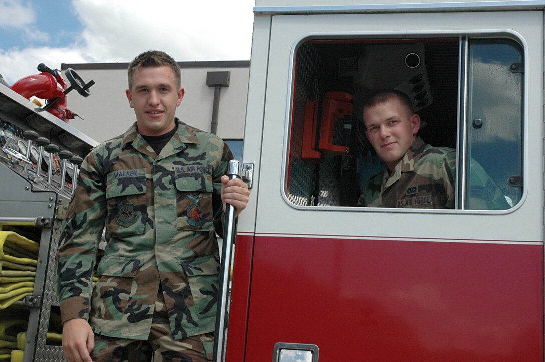 McCHORD AIR FORCE BASE, Wash., - Senior Airmen Shawn Walker, left, and Jesse Berg, gained experience quickly while deployed, much more quickly than their traditional Reserve training would have provided. Both are Reservists assigned to the 446th Civil Engineer Squadron.  (U.S. Air Force photo by Senior Airman Paul Haley)