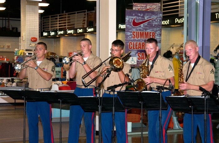 MARINE CORPS BASE CAMP LEJEUNE, N.C. (July, 19, 2006) ? Marines and family heckle and cheer on players during the Single Marine Program-sponsored dodgeball tournament, July 19. Joining the alternative sport craze, Marines from all units on base came together with one thing in mind ? to defeat their fellow brother-in-arms in dodgeball.