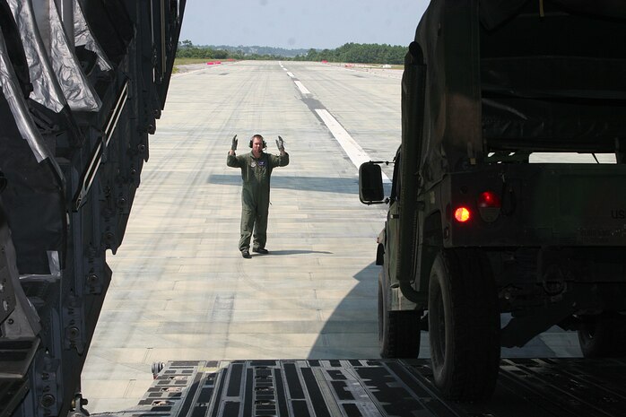 MARINE CORPS BASE CAMP LEJEUNE, N.C. (July 19, 2006) ? Lance Cpl. Brian Jaques throws a ball at an opponent during the Single Marine Program-sponsored dodgeball tournament, July 19. Jaques is a combat cameraman with Combat Logistics Battalion 27, 2nd Marine Logistics Group.