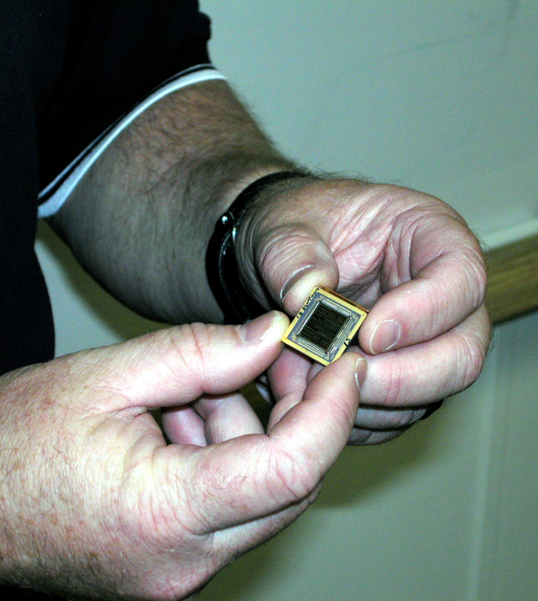 KIRTLAND AIR FORCE BASE, N.M.— Close up view of a chalcogenide random access memory (C-RAM) chip, which can reliably store four million bits of data in space.  (Air Force photo by Michael P. Kleiman) 