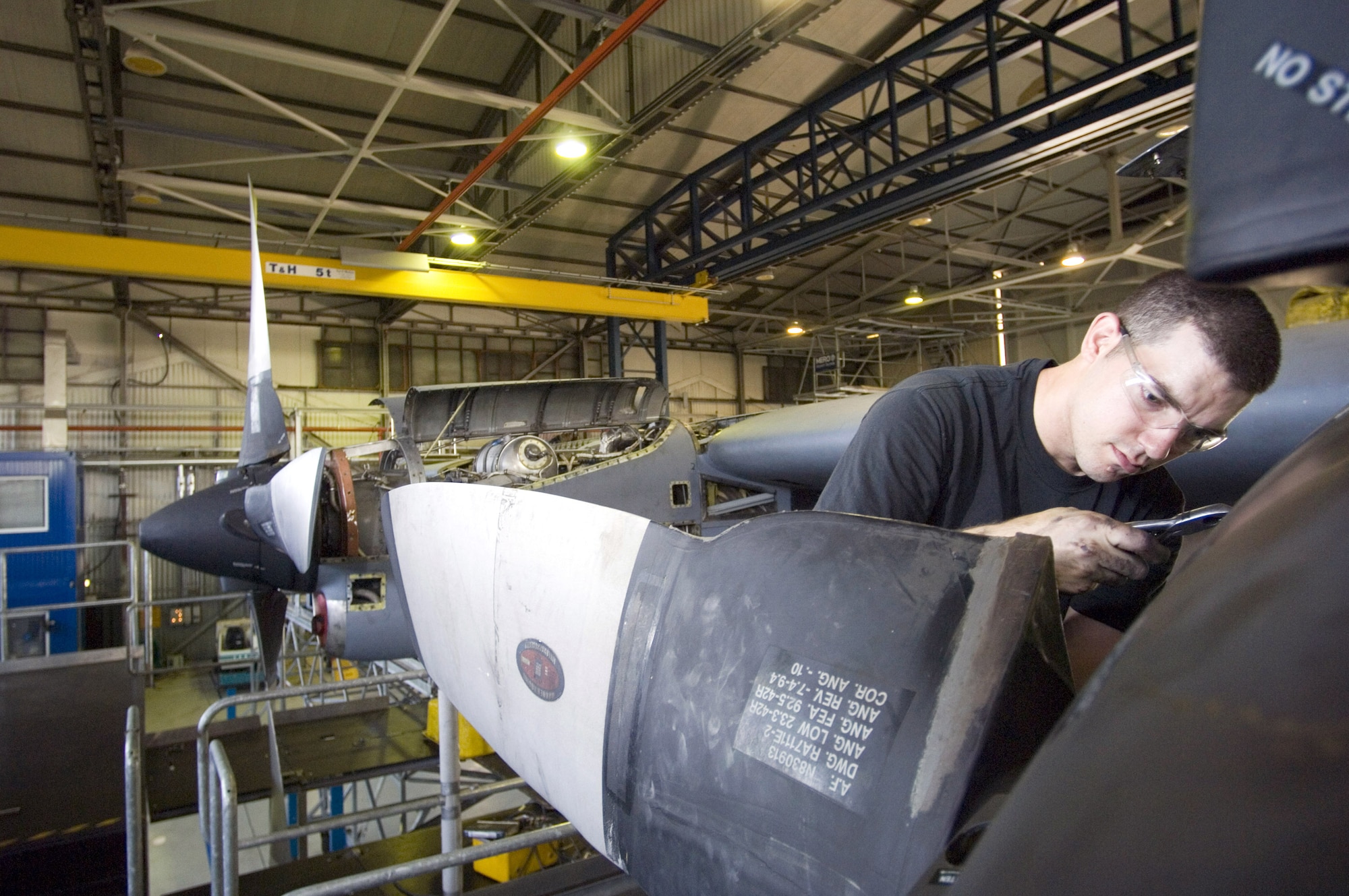 Staff Sgt. Kianta Asplund works on a C-130 Hercules engine during an isochronal inspection at Ramstein Air Base, Germany, on July 18. Sergeant Asplund, of Melbourne, Fla., is an engine mechanic with the 86th Maintenance Squadron. (U.S. Air Force photo/Master Sgt. John E. Lasky)
