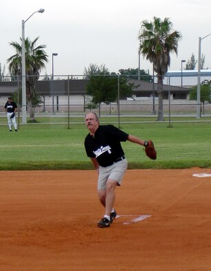 Larry "Hoppy" Hopkins pitches during an intramural league softball game at Homestead Air Reserve Base, Fla.  Hoppy plays for the 482nd Security Forces team and works as a Deparment of Defense Police Officer a the base.  He has been playing softball here for 25 years (Air Force photo by Jake Shaw).