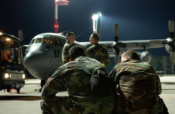 Airmen from the 435th Security Forces Squadron wait to leave Ramstein Air Base, Germany, on July 19. The Airmen are assisting humanitarian efforts for Americans who have left Lebanon for Cyprus. (U.S. Air Force photo/Staff Sgt. Angela B. Malek) 
