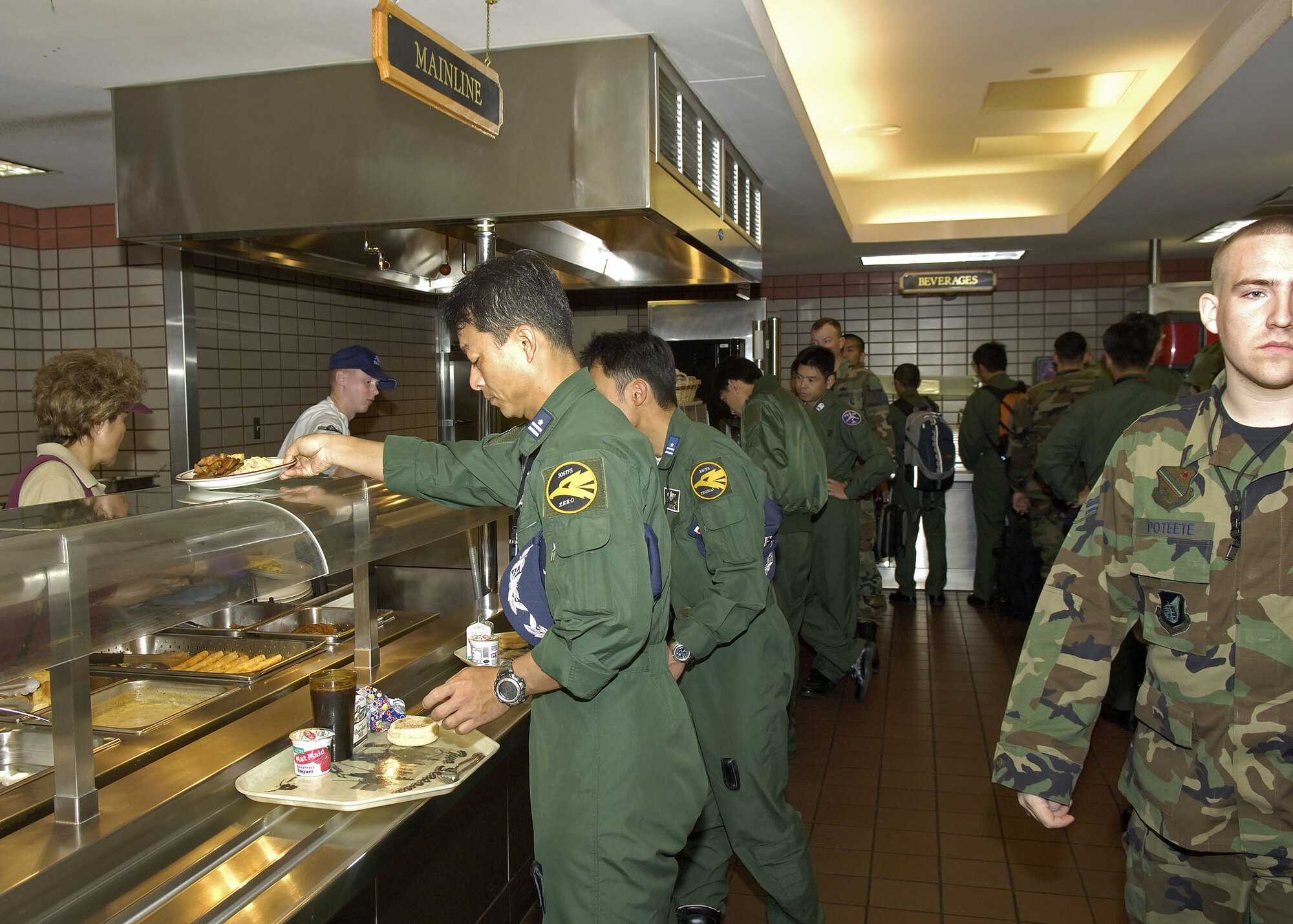 EIELSON AIR FORCE BASE, Alaska - The lineup at the Two Seasons dining hall for lunch. The dining hall has gotten quite busy during Excersise Co-operative Cope Thunder 06-3 (CCT06-3). Photo by Cpl J.A. Wilson, CCT06-3, Canadian Public Affairs