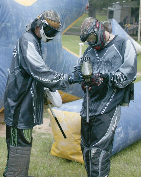 A paintball team member gets his paintball gun jammed.  (U.S. Air Force photo/Senior Airman John Gordinier)