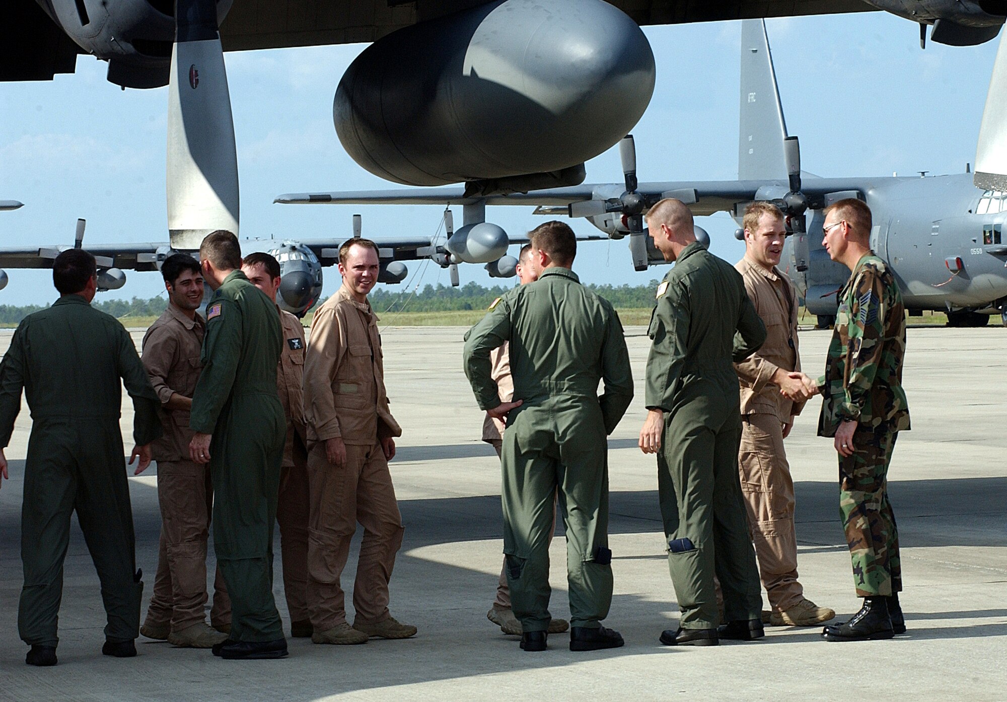 Airmen from the 8th Special Operations Squadron are greeted July 14 as they return from deployment to Southeast Asia.  The returning MC-130E Combat Talon I was the last-ever to be used on an active-duty combat mission. (Air Force Photograph by Senior Airman Jessica Klingler)
