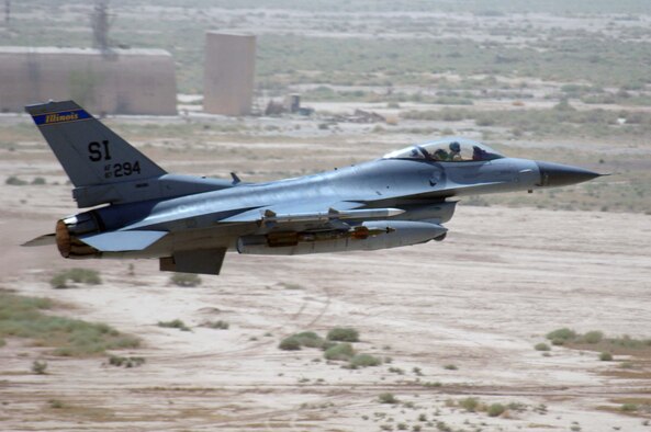 BALAD AIR BASE, Iraq -- An F-16 Fighting Falcon assigned to the 332nd Expeditionary Fighter Squadron, here, takes off on an Operation Iraqi Freedom mission July 21.  The F-16 jet is deployed from the 183rd Fighter Wing, Springfield Air National Guard, Ill., and provides close air support and "eyes in the skies" intelligence, surveillance and reconnaissance for ground forces during combat operations. (U.S. Air Force photo by Staff Sgt. Tony R. Tolley)
