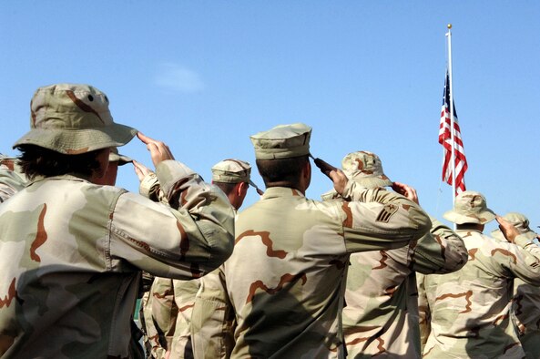 Members of the 455th Air Expeditionary Wing celebrate Independence Day at Bagram Airfifeld, Afghanistan, by participating in a flag ceremony July 4.