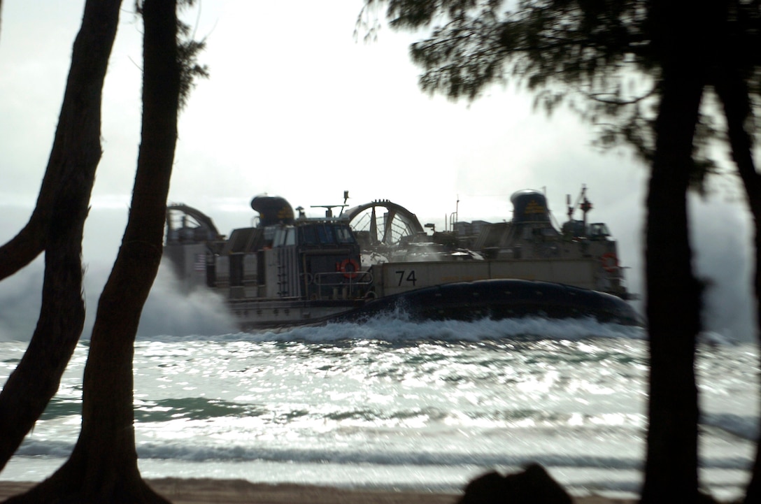 060722-N-8629M-091::n::Bellows Air Force Station, Hawaii (July 22, 2006) - A Landing Craft Air Cushion (LCAC) from Assault Craft Union Five (ACU-5) attached to the multi-purpose amphibious assault ship USS Bonhomme Richard (LHD 6) lands on Bellows Beach on the Hawaiian island of Oahu during an amphibious assault exercise. Eight nations are participating in RIMPAC, the world's largest biennial maritime exercise. Conducted in the waters off Hawaii, RIMPAC brings together military forces from Australia, Canada, Chile, Peru, Japan, the Republic of Korea, the United Kingdom and the United States. U.S. Navy photo by Mass Communication Specialist 2nd Class Rebecca J. Moat (RELEASED)::n::::n::