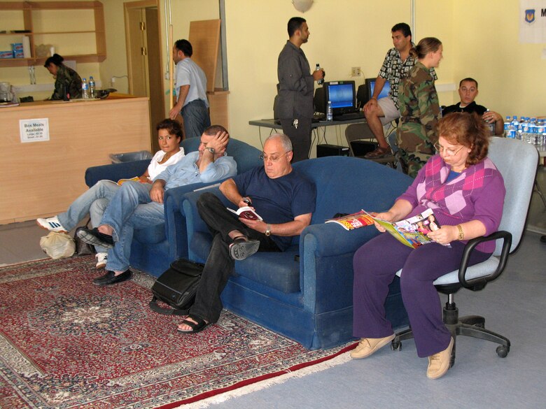 American citizens who departed Lebanon read and watch television during their stay at the Patriot Village at Incirlik Air Base, Turkey, on July 22. The base has provided telephones, Internet service, television, beds and showers to the displaced American citizens while they wait to travel to the United States. (U.S. Air Force photo/Master Sgt. Bob Herron) 