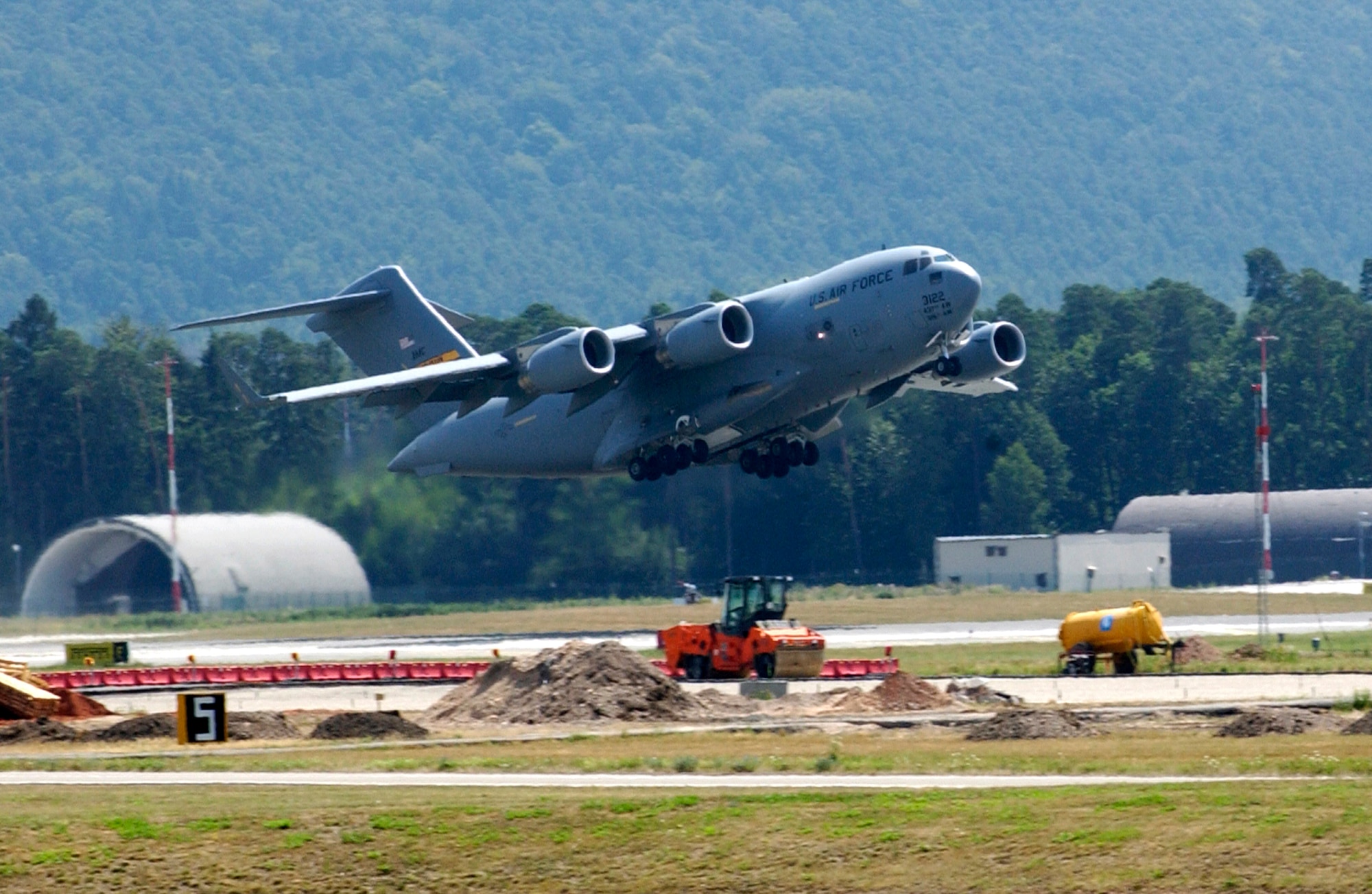 A C-17 Globemaster III takes off from Ramstein Air Base, Germany, on July 23, filled with Americans from Lebanon. Airmen at Ramstein provided humanitarian assistance for American citizens departing the Lebanon crisis on their way to the United States. (U.S. Air Force photo/Staff Sgt. Angela B. Malek)