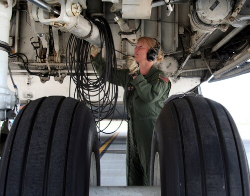 Flight Engineer, Tech. Sgt. Tammy Goble from the 89th Airlift Squadron, prepares a C-5 Galaxy for take-off at Wright-Patterson AFB, Ohio.  It is the first C-5 overseas mission to Ramstien Air Base, Germany for the 89th since the retirement of the C-141 Starlifter this past May.  (U.S. Air Force Reserve photo by Senior Airman Martin Moleski.)