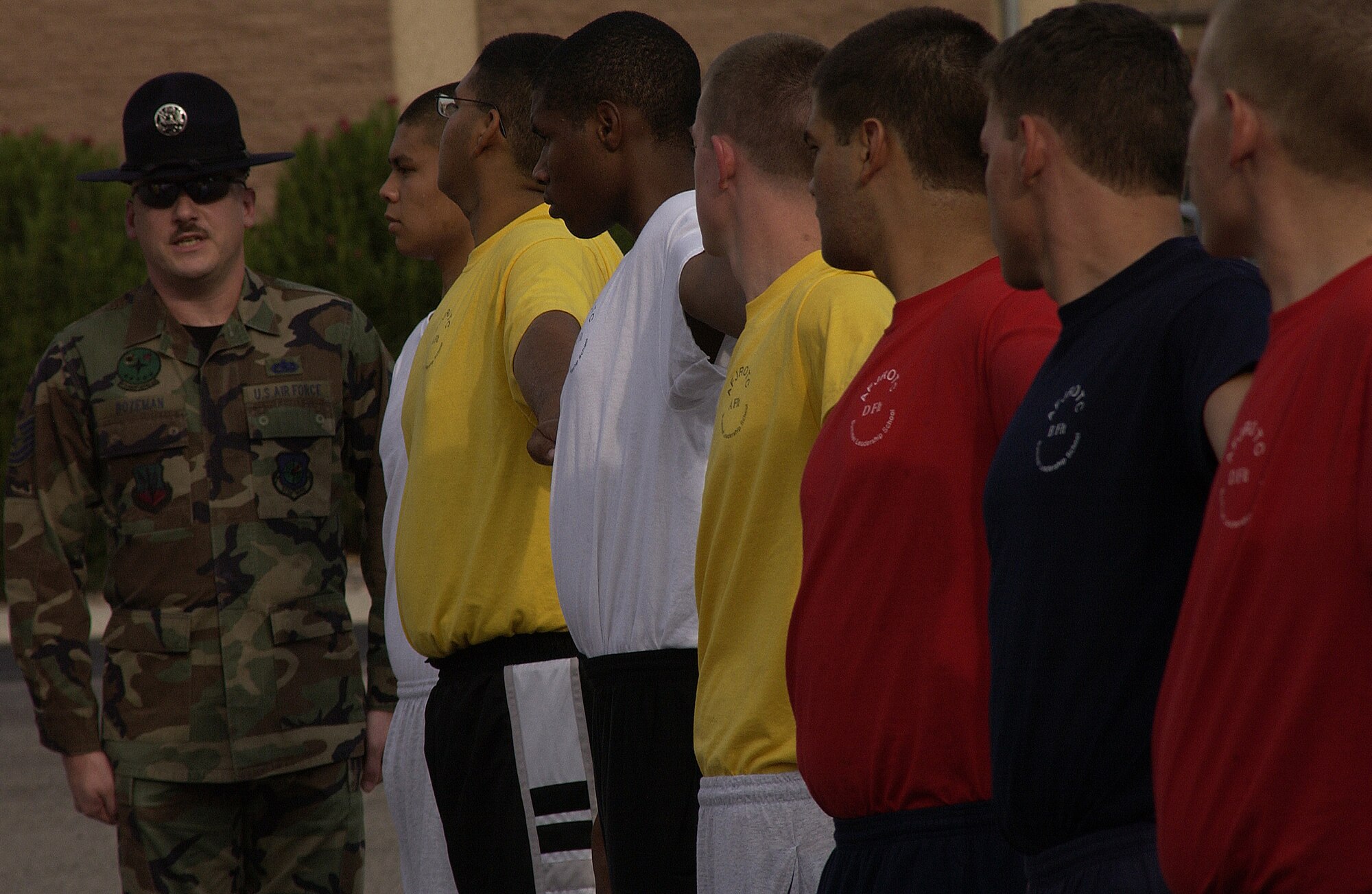 Tech Sgt James Bozeman teaches cadets how to get proper spacing in formation. Air Force Junior Reserve Officer Training Corps cadets  are at Nellis AFB, Nev., to get some military experience during the summer break. Nellis Airmen volunteer as military training instructors. (Air Force photo/Airman 1st Class Jason Huddleston)