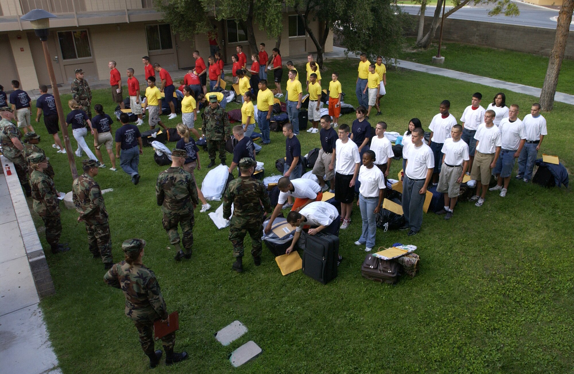 Cadets receive instructions on room preparation after they arrive at Nellis AFB, Nev. Air Force Junion Reserve Officer Training Corps cadets  are at Nellis AFB, Nev., to get some military experience during the summer break. Nellis Airmen volunteer as military training instructors. (Air Force photo/Airman 1st Class Jason Huddleston)