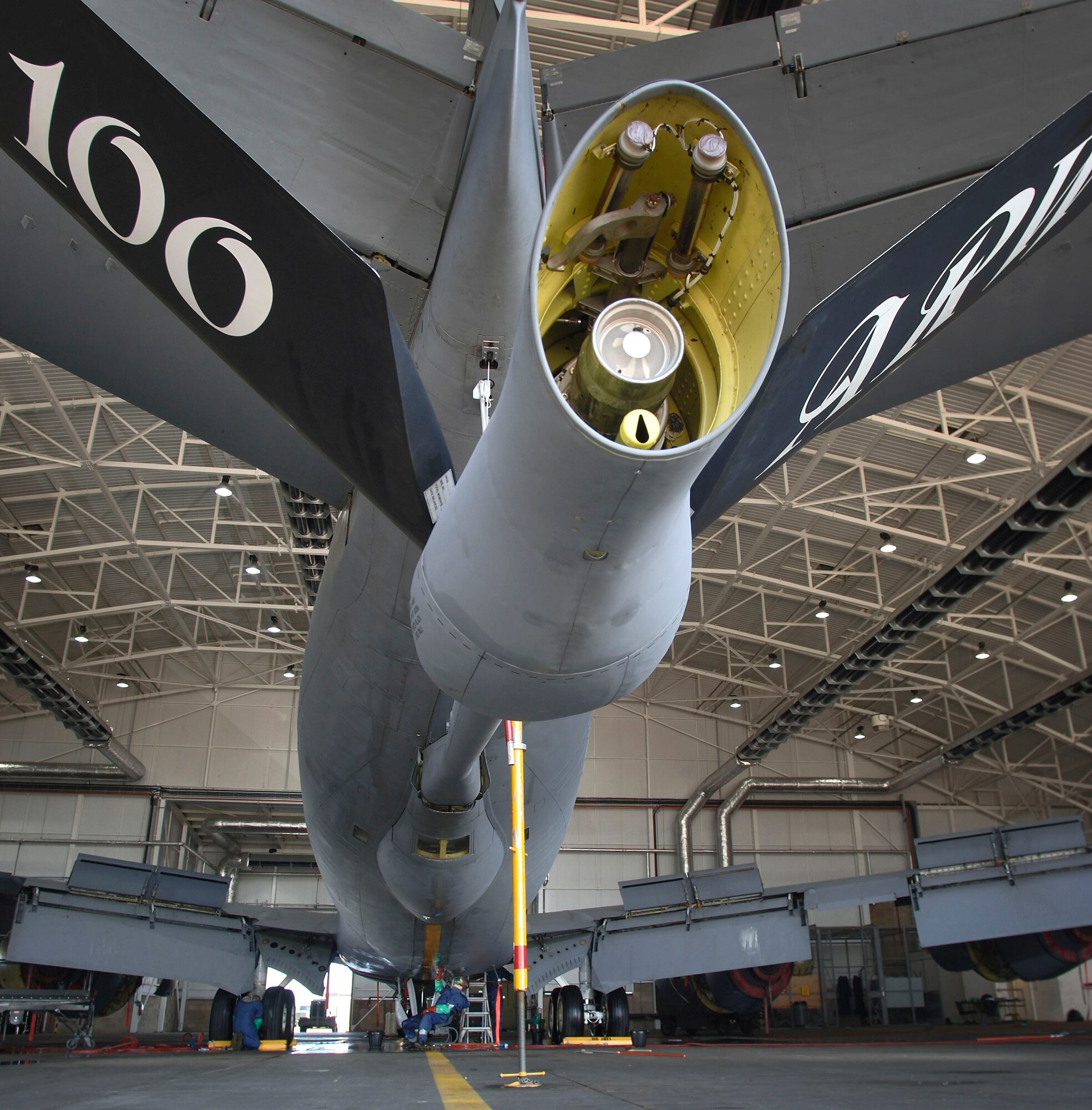 Senior Airman Jeremy Lueth hand-washes the centerline on the underbelly of a KC-135 Stratotanker at Royal Air Force Mildenhall, England, on July 24.  The Airman is with the 100th Aircraft Maintenance Squadron. He spends 12 hours a day with a cleaning team that keeps the nearly 50-year-old aircraft corrosion free and looking its best. (U.S. Air Force photo/Master Sgt. Lance Cheung)

