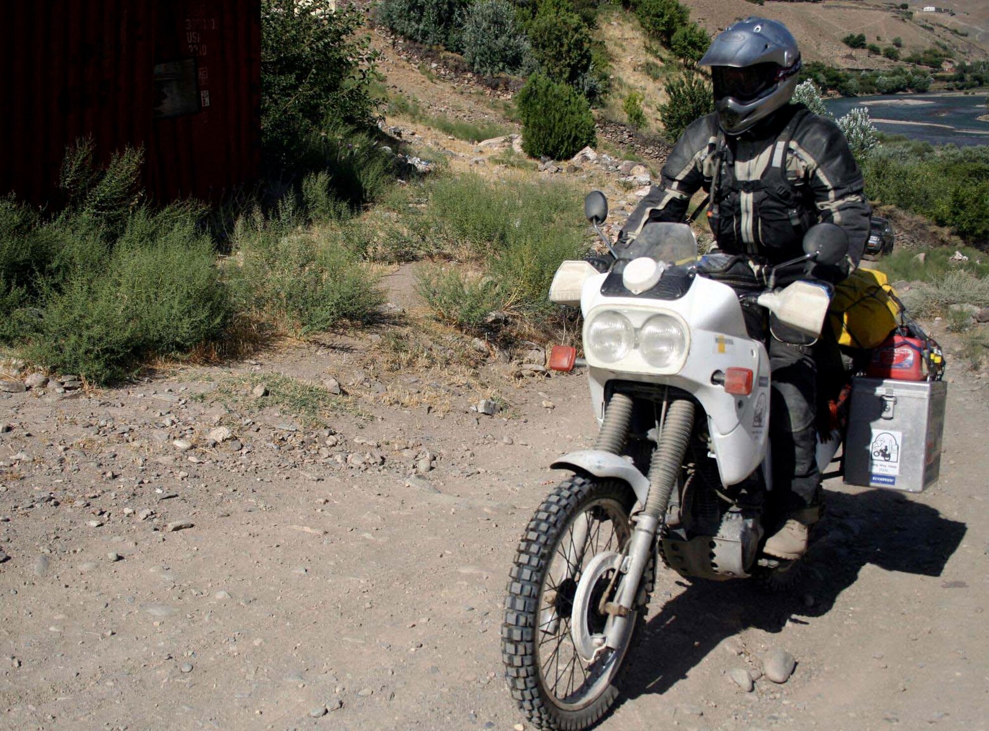 British Army Lieutenant Colonel Gary Bateman rides through the Panjshir Province on June 30 in the Hindu Kush mountain passes toward Tajikistan. (Courtesy photo by Air Force Tech. Sgt. John Cumper).