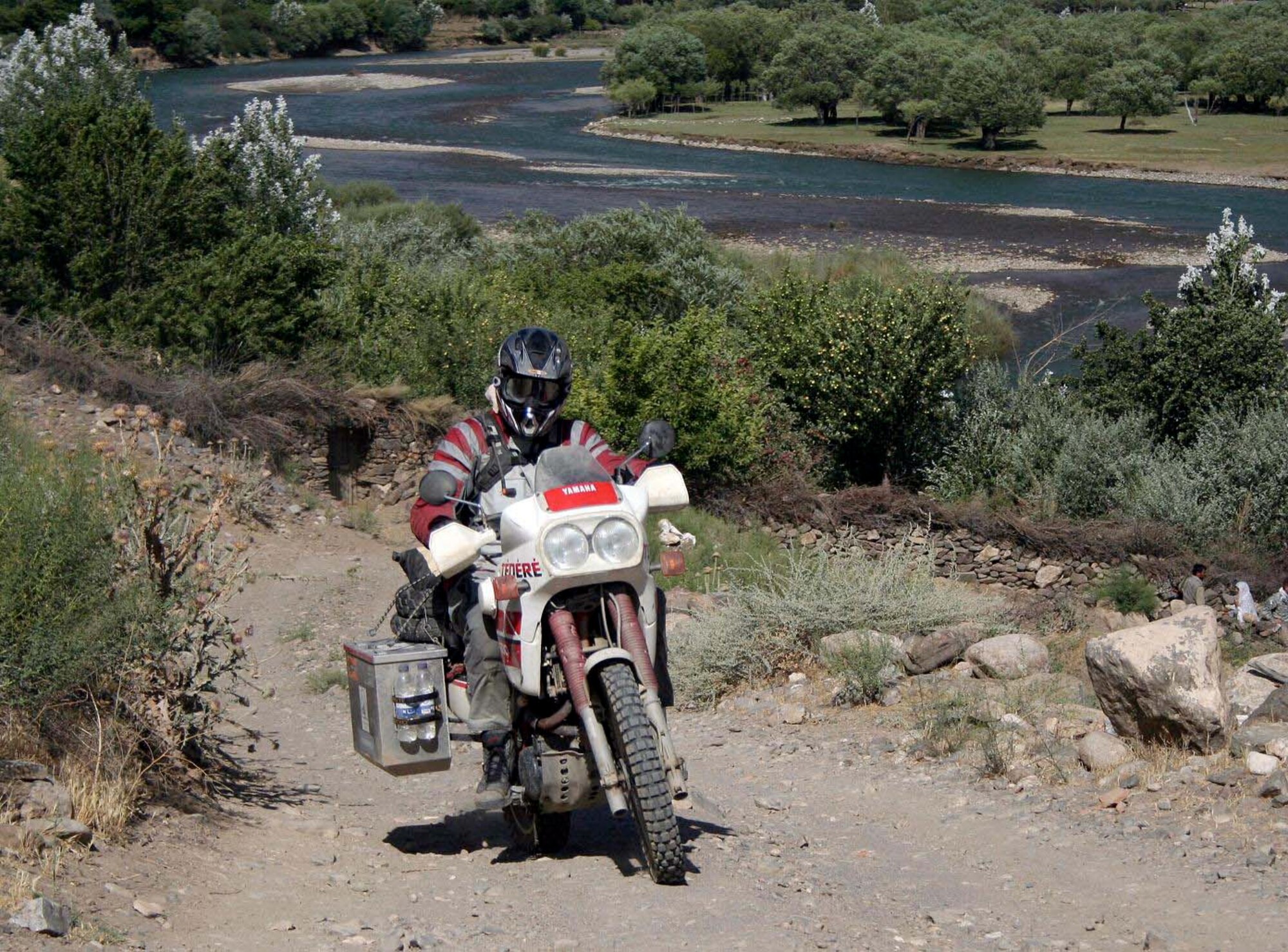 British Army Lieutenant Colonel Felix Gedney rides through the Panjshir Province on June 30 in the Hindu Kush mountain passes toward Tajikistan. (Courtesy photo by Air Force Tech. Sgt. John Cumper).