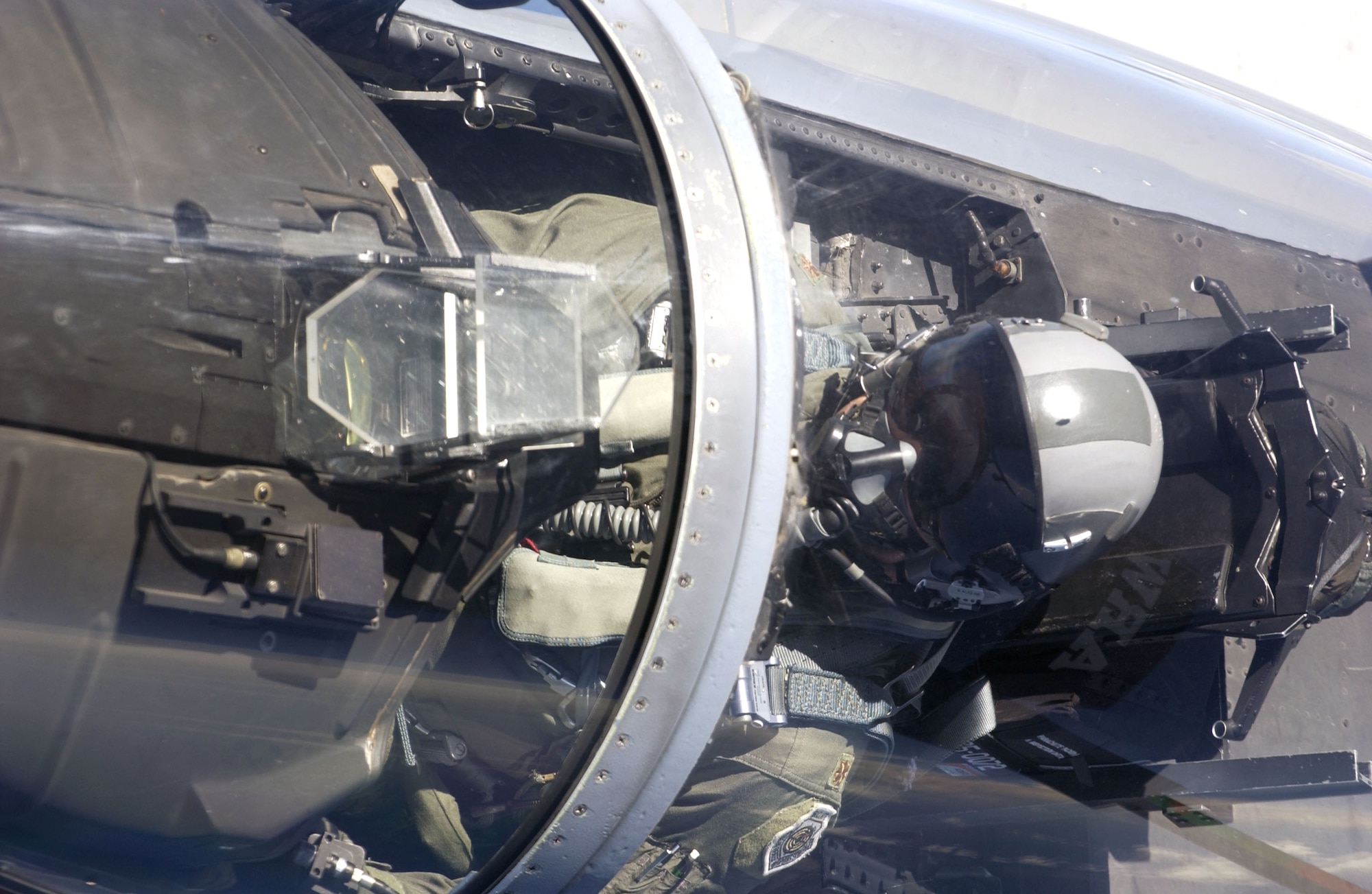 Maj. David Lynch looks up from his F-15 Eagle during a refueling by a KC-135 from the 434th Air Refueling Wing near Jacksonville International Airport, Fla., on July 20. Major Lynch is with the Air National Guard's 125th Fighter Wing. (Air National Guard photo/Master Sgt. Shaun Withers) 

